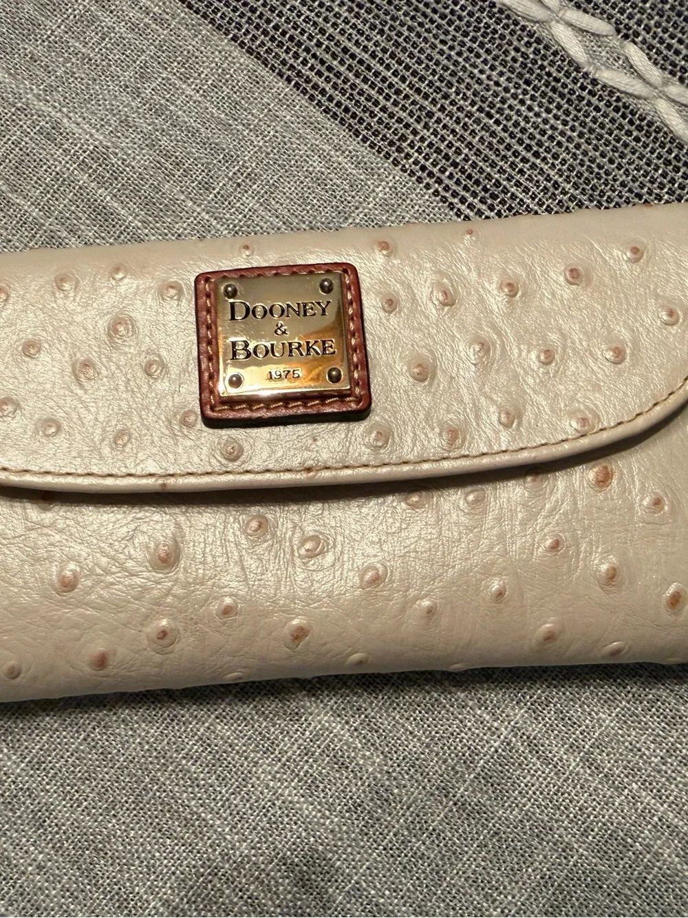 Dooney & Bourke Cream Ostrich-Texture Zip Wallet